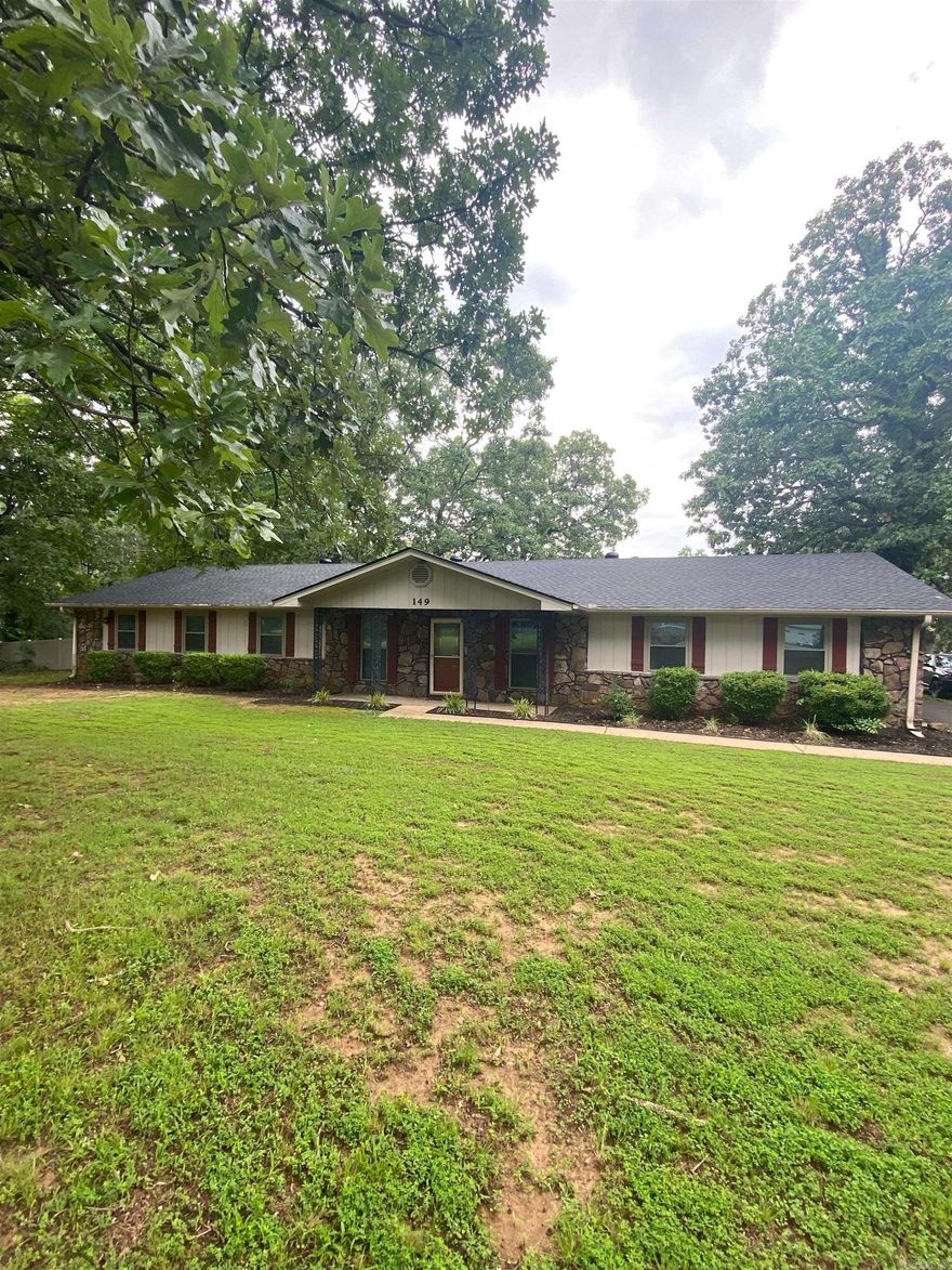 BRAND NEW ROOF! It has a 10 Year Transferable warranty. Country living just minutes from Conway! This home is updated and ready to go! It has 5 acres with a new vinyl privacy fence, new heat and air installed in 2023, water filtration system, pole barn, workshop, green house and so much more. Inside of the home has a nice open concept with lots of room for everyone. Give us a call today to set up your showing.