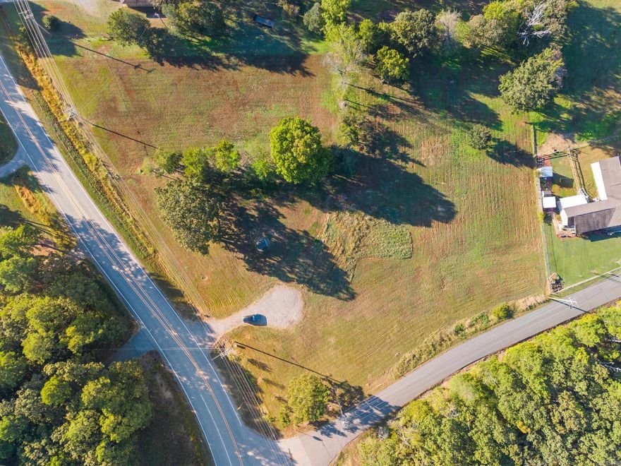 It’s rare to find Conway Corp utilities with no HOA fees and no restrictive covenants—especially in such a prime location! These two adjoining lots (totaling 2.7 acres) offer space, privacy, and a setting that feels rural while still providing easy access to the interstate. A perk test is already complete on one lot, making it even easier to start planning your dream home, shop, or barndominium.