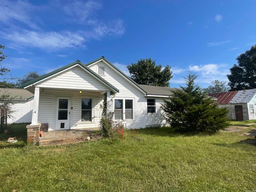 Looking for space, privacy, and a project you can truly make your own? This spacious fixer-upper is packed with opportunity and value! Sitting on 1.5 peaceful  acres, this property offers over 1,500 sq ft of living space, a 2400 sq ft shop, a detached garage, and all the potential to become your dream home or investment property. Agents see remarks.