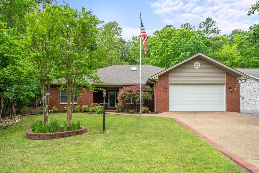 Located on the East side of the Village, across the street from Lake Balboa, this brick beauty will steal your heart. Pull into your level driveway and 2-car garage, with a special bonus: one side is extra deep, providing ample space for boat storage or a workshop. This deep bay also features a rear garage door, opening to even more covered area in the rear – perfect for storing outdoor equipment or creating a shaded workspace. Inside, you'll find a move-in-ready haven with 3 bedrooms and 2 bathrooms. Enjoy a bright and airy open concept living and dining area, ideal for entertaining. The living room features a vaulted ceiling and a cozy wood-burning fireplace, complete with a ducted blower system to efficiently circulate warmth on cooler evenings. A separate breakfast area offers a sunny spot for your morning coffee. What a beautiful place to call "home"!