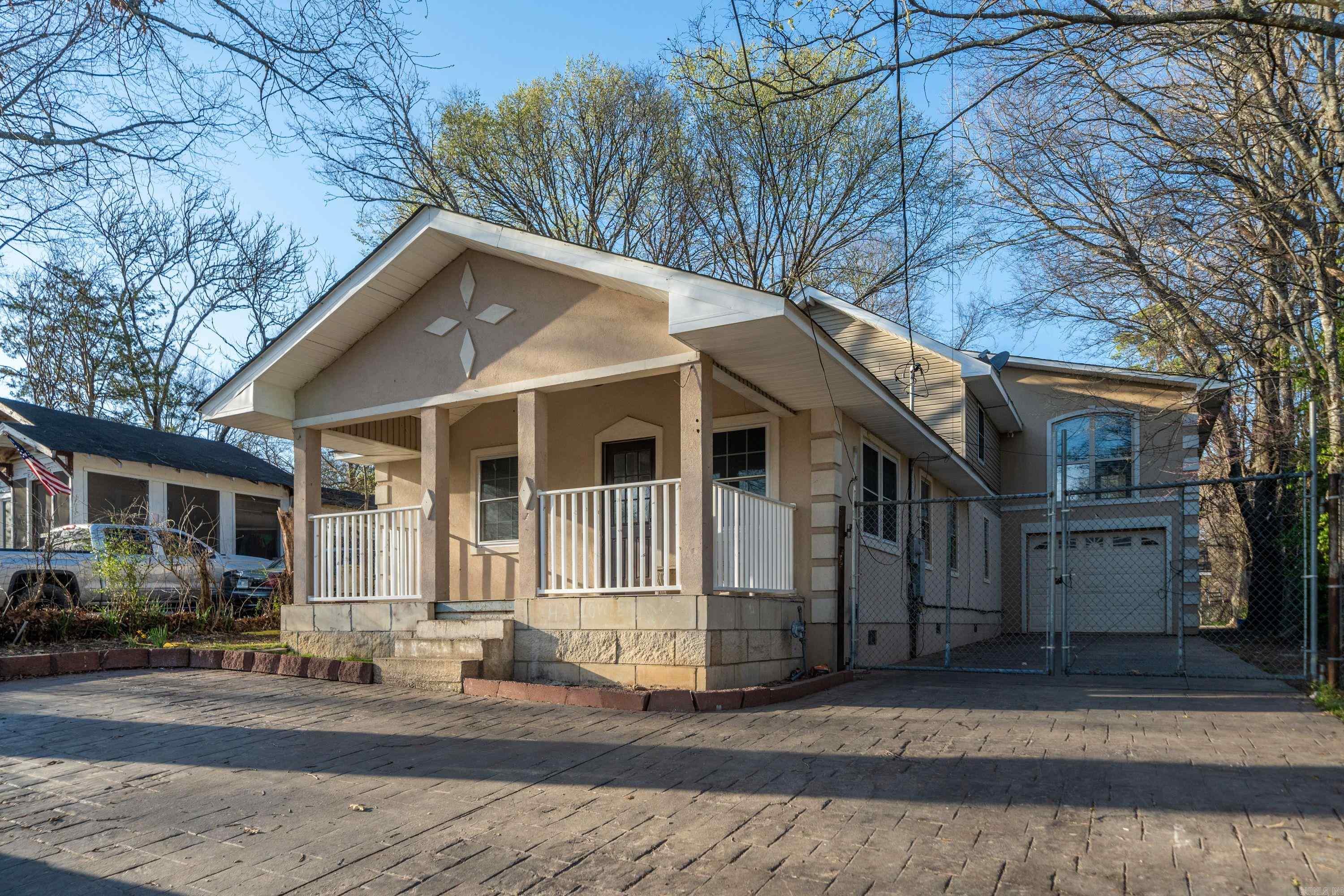 Convenient location! Nice home in the city for second generation or large family, hardwood floors, tile, five bedrooms, all electric, 2 story, large drive thru garage, partially fenced yard, couple of blocks to Oaklawn Park and casino, close to downtown, hospitals, and restaurants.
