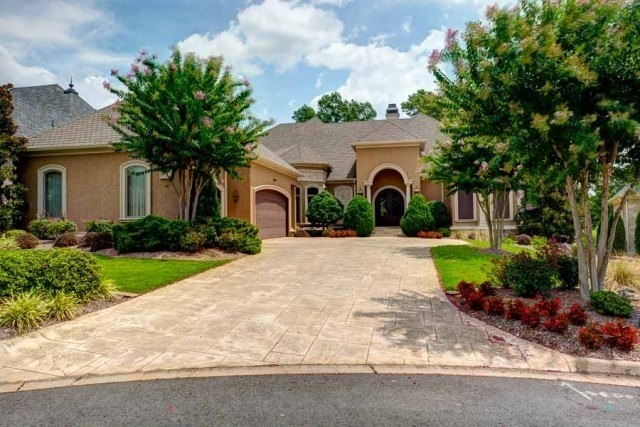 Totally custom built, by well known builder Kevin Hughes, this Hallen Court home offers the finest in architecture, finishes and location.  All major rooms overlook the Chenal Country Club “Founders” golf course. Main level features include; foyer, formal living and dining rooms, open kitchen, den and informal dining areas, owners  and guest suite, home office, powder bath and laundry. Upstairs houses two guest suites and a media den.  Additional features include a three car garage and additional storage.
