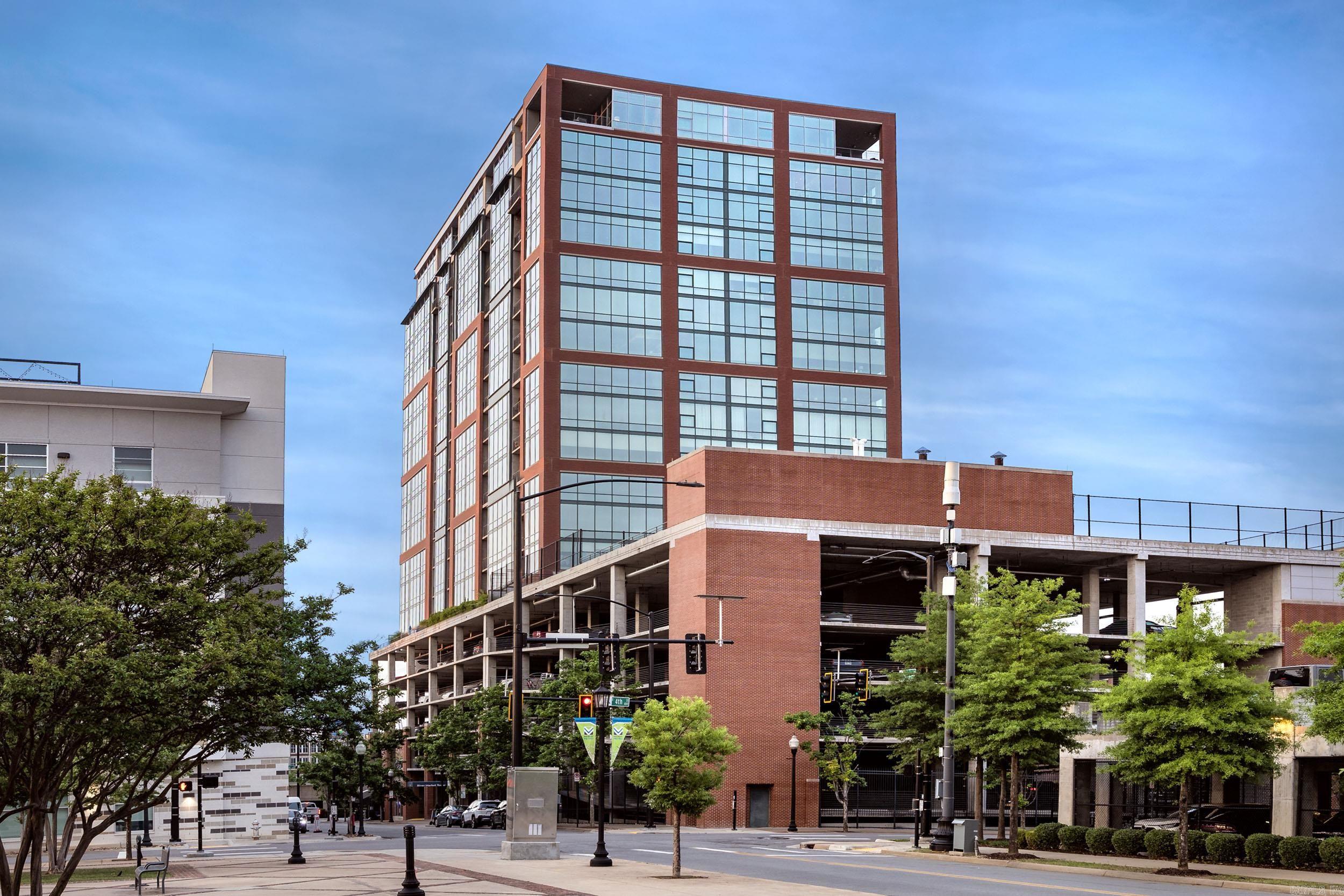 Condo living at its finest in the River Market Towerjust got better! Come see the newly remodeled lobby and fitness facility. Enjoy sweeping views of the city and Arkansas River when living in this incredible condo. This 2 BR/2BA condo offers new hardwood floors throughout, premium appliance package, located in the heart of the River Market District within walking distance to area restaurants, bars, galleries and shopping. Building amenities include swimming pool, fitness center, tennis and basketball courts, rooftop deck and party room and concierge services are included. This unit comes with two reserved parking spaces in the secure garage and one storage unit (not climate controlled). NEW HVAC JUNE 2025!! This is a MUST SEE!