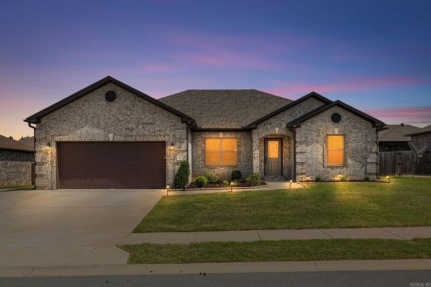 Welcome to 33 Cimarron Circle in Cabot, Arkansas! This beautiful all brick home features a split~open floor plan with LOTS of space and natural light! This home has all the extras coffered ceiling, mudroom and large laundry room. Fall in love with the HUGE kitchen that has tons of storage, counter space, a large island, under cabinet lighting, stainless steel appliances and a pantry! Primary bedroom features a tray ceiling and in the primary bathroom you will find a walk-in shower with glass doors, soaking tub, double vanity sinks, a toilet room, & a huge walk-in closet! This home also features great sized guest bedrooms, ceiling fans throughout the home, tons of closet space throughout. Heading out back you will find an oversized covered back patio and the fenced yard is perfect for entertaining! This is home! Call today for your private tour!!