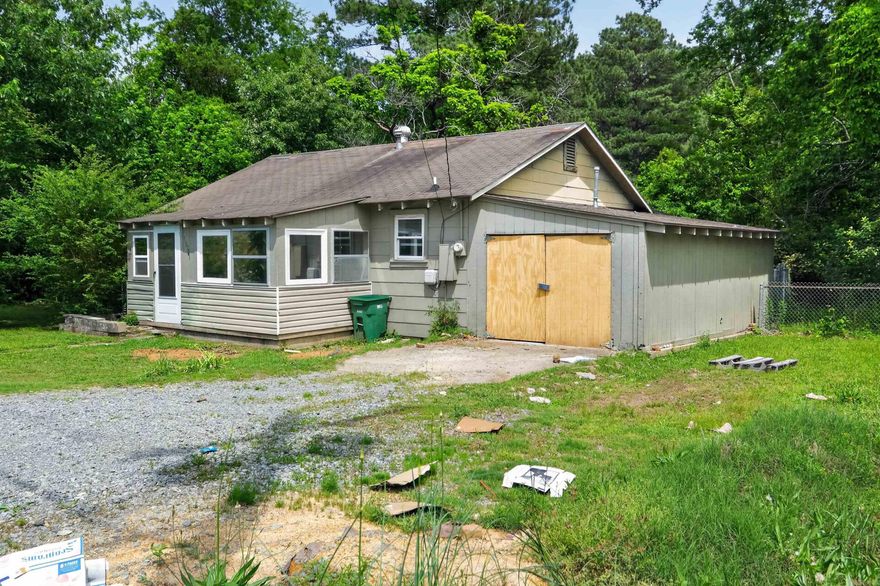 This private 3-bedroom, 2-bath home sits on a full acre and backs up to serene green space, offering a peaceful, secluded setting. Inside, you’ll find a comfortable layout with plenty of natural light and space to relax or entertain. The expansive yard provides endless possibilities for outdoor living, gardening, or recreation. Additionally this property features extra storage, giving you plenty of room for tools, equipment, or hobbies. Perfect for those seeking privacy without sacrificing convenience.