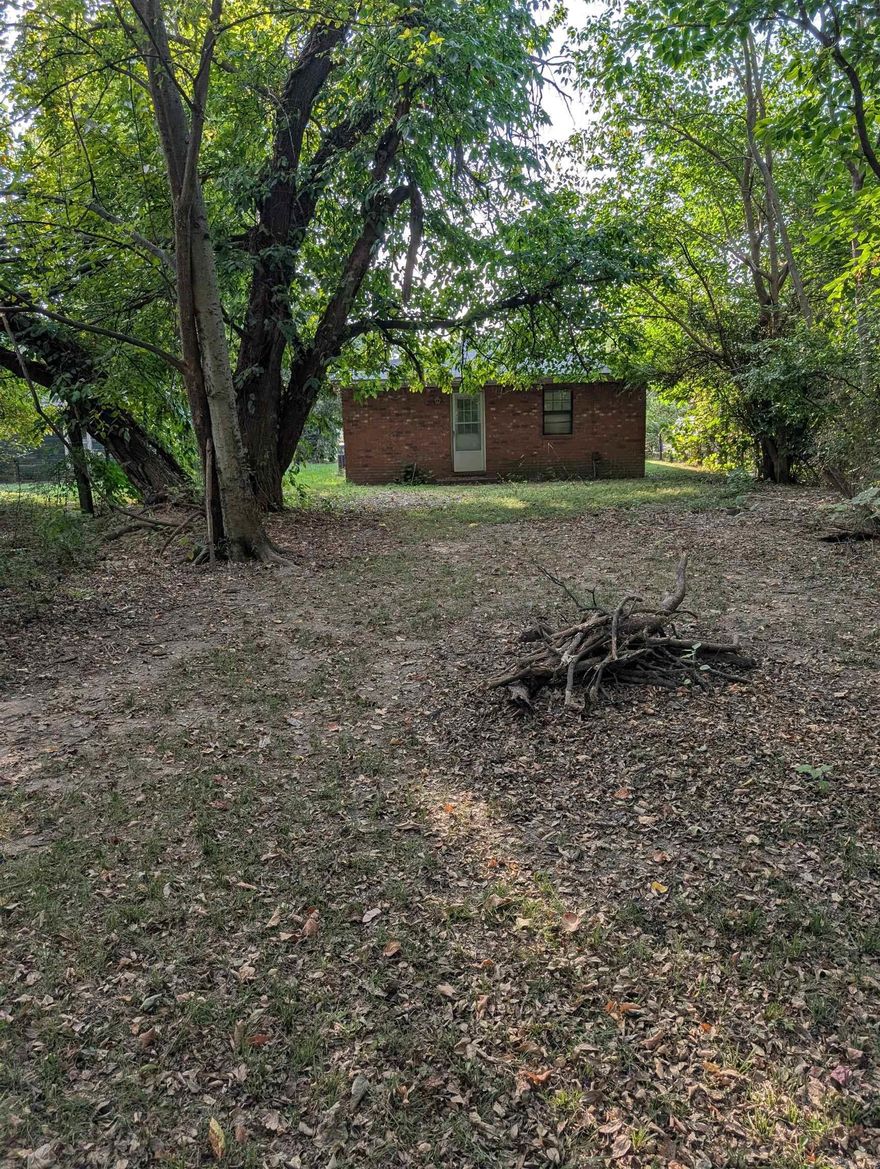 Great opportunity to put your personal touches on this conveniently located 2-bedroom brick home which features a large backyard.  Investors a great find to add to your portfolio.