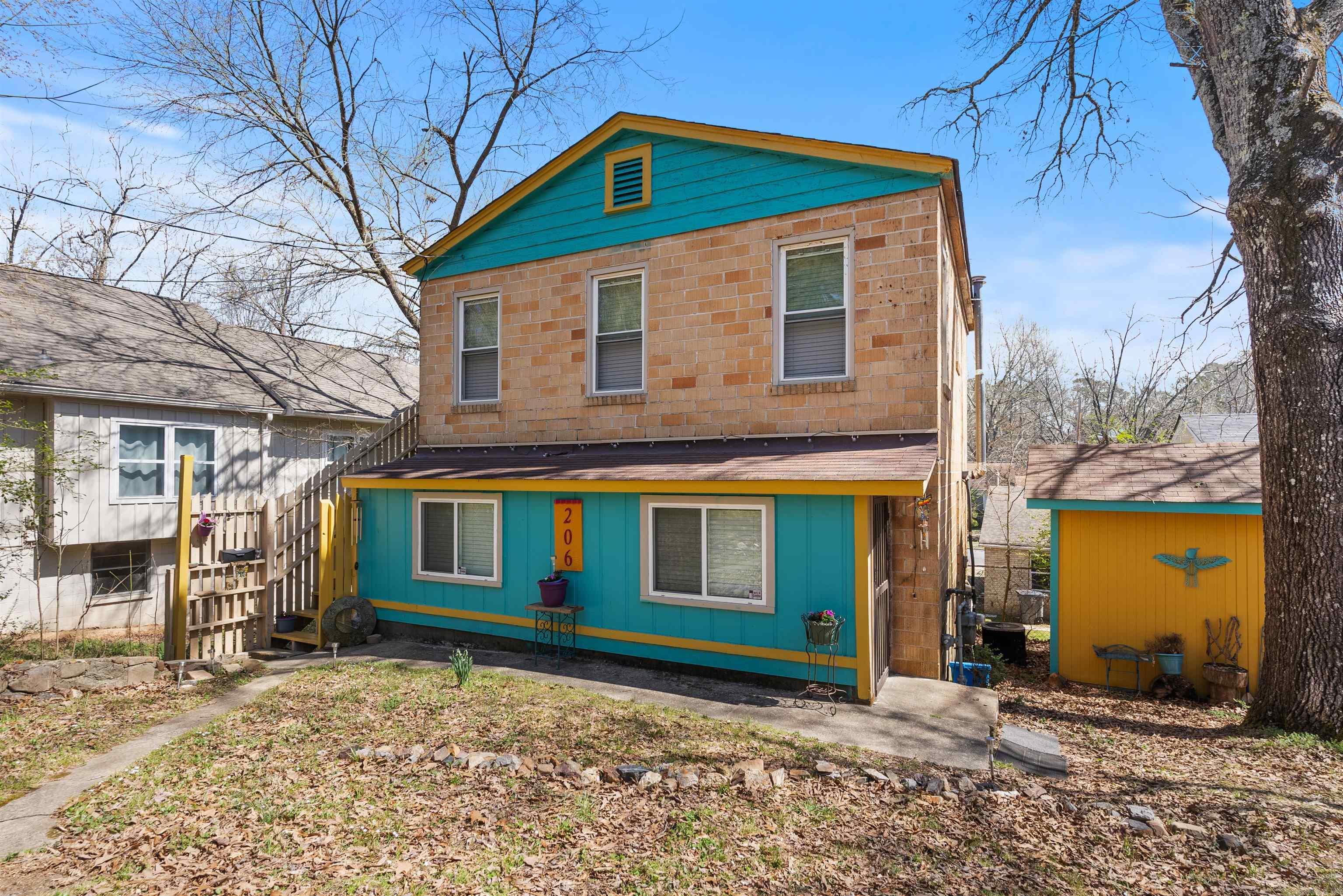 Do you want to live in a treehouse? Check out this one of a kind, well maintained home! It has a screened-in balcony, treetop views, outdoor storage, is walking distance from the Pullman trailhead and in a prime location for visiting downtown hot springs - while also providing tons of quiet privacy. The house is very close to Rick's Pond, DeSoto Park, Gulpha Gorge and so much more! It has a newer roof, updated plumbing, new electrical panel and other items were serviced recently such as the hot water heater, dryer, roof vent and faucets. This is a highly motivated seller. Bring all offers! The trees have been trimmed and it's ready for you to move in! All of the appliances convey.
