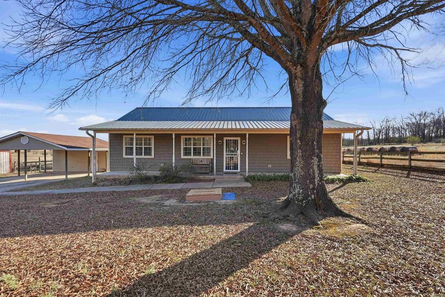 Discover this spacious 4-bedroom, 2.5 bath home on 3 peaceful acres in the Naylor area of Mount Vernon School District, featuring a flexible room ideal for a 5th bedroom, office, homeschooling, or craft space. Included is a safe room for peace of mine. The large great room is perfect for entertaining, dining, or movie nights with the projector and screen. Outdoors, enjoy a pond, a 2-car covered carport with storage, a shop perfect for additional garage space, plus an additional large shop building with separate electricity meter- perfect for all of your hobbies and projects. Recent updates include a new metal roof, newer hot water heater, dishwasher, and well pump and filter. With no restrictions and a convenient location just a short drive to Vilonia and only 20-25 minutes from Conway and I-40, this property is a must-see. Agents see Remarks.