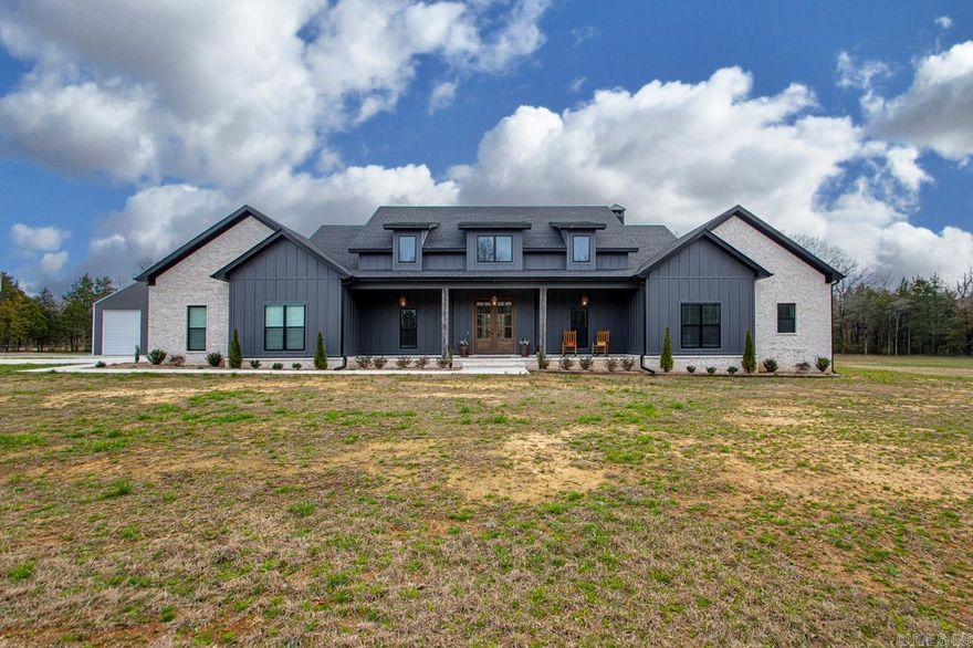 Beautiful custom built home on 10 acres in Wooster. This 4 bed/3.5 bath home offers exquisite features and detail through out: Primary suite and junior suite with custom tiled showers, office with built in custom cabinets, quartz and marble countertops, large walk-in closets with built-ins, kitchen equipped with a Bertozoli range, sonic ice machine and custom cabinets. Salt water pool and outdoor kitchen, 40x60 shop with 16ft side walls and two 14ft doors, automatic cellular gated entry, 1000 gallon (buried) butane tank, Generac whole house generator and 400 amp service on one meter. Garage has a built in dog shower and staircase leading to the attic.