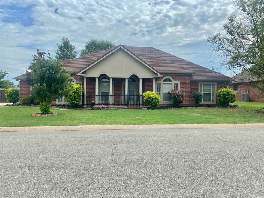 This updated home has an open floor plan with 3 bedrooms, 2 full bathrooms, library/office, formal dining area, heated and cooled sunroom, and large backyard with privacy fence. Tall ceilings with beautiful crown molding and tile floors throughout. The master bathroom has his and hers sinks, a soaking tub, separate shower, and walk in closet. There is a 4x4 steel saferoom in the garage and still plenty of room for 2 vehicles to fit as well. The fence around the front patio is great for relaxing outside with children or pets. The metal roof was installed in 2017 and has a lifetime warranty.