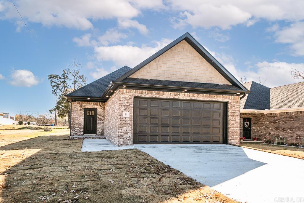 Pretty, all brick home new construction home offers 3 bedrooms, 2 baths, open concept, all electric, with covered patio located in the heart of Cabot. Convenient to everything! Spacious living area with vaulted ceiling connected to a well designed kitchen and dining space. Kitchen has quartz countertops, an island with pop up electrical outlet and stainless steel appliances. The primary bedroom is separate from the other two and has tray ceiling.....primary bathroom has 2 sinks and shower/tub combo. Laundry room! Spacious 2 car garage.
