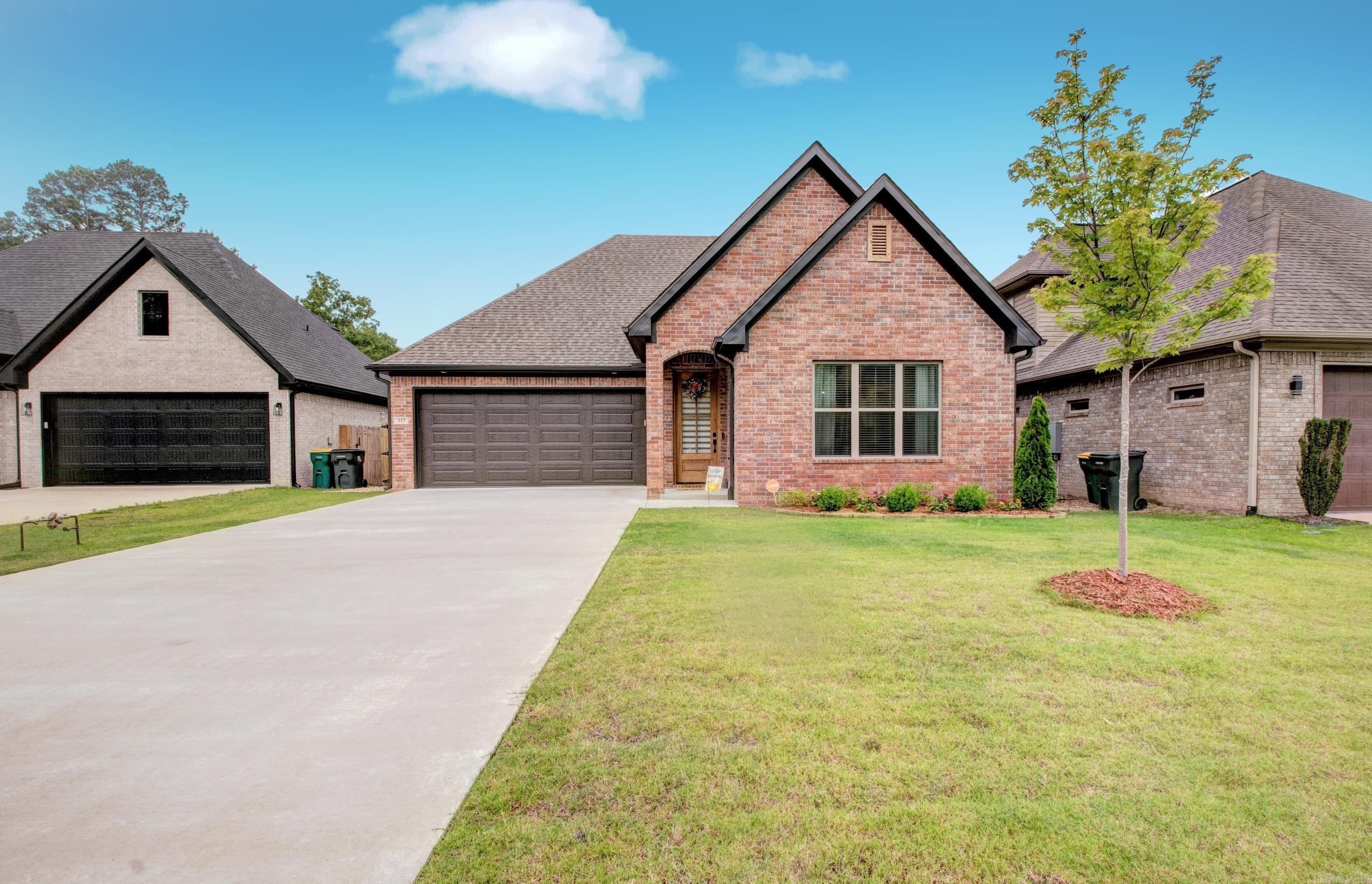 This almost new home awaits it's new owner. Only 1 year old. Inviting open floor plan has spacious living area with fireplace flowing into the dining space and on into the kitchen. Custom cabinetry and sleek stainless appliances featuring a gas range and a large bar area for informal dining. Perfect for entertaining. Primary suite features a luxurious bath with soaking tub and separate shower. Main level also features a half bath and laundry room along with a mud room. Two large bedrooms upstairs and a big bonus area that could be a perfect playroom for children, craft room. Seller upgraded many fixtures throughout. Wonderful screened in patio makes enjoying the outdoors easy. Small yard requiring very little maintenance. Great location, close to restaurants and shopping. Don't miss out!