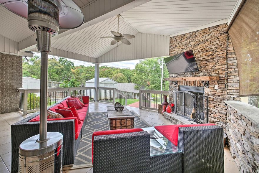 Welcome to 205 Gleneagle Loop, a stunning lakeside retreat that defines luxury living. This fully furnished residence boasts 4 bedrooms, 2 1/2 bathrooms, and is strategically located directly on the picturesque Lake Hamilton. Enjoy the convenience of a private boat dock with a lift, making water activities a breeze. The property has served as a successful vacation rental, generating an impressive average of over $80,000 a year in rentals over the last two years. The outdoor space is a true haven, featuring a large covered area with an outdoor kitchen, wood-burning fireplace, and a TV – perfect for entertaining or simply unwinding with a view. This gorgeous home is impeccably updated with beautiful decorations and furnishings, creating an inviting atmosphere throughout. With parking space for up to 6 vehicles in front of the house, this residence is not just a home; it's a lifestyle. Don't miss the chance to make 205 Gleneagle Loop your own piece of lakeside paradise.