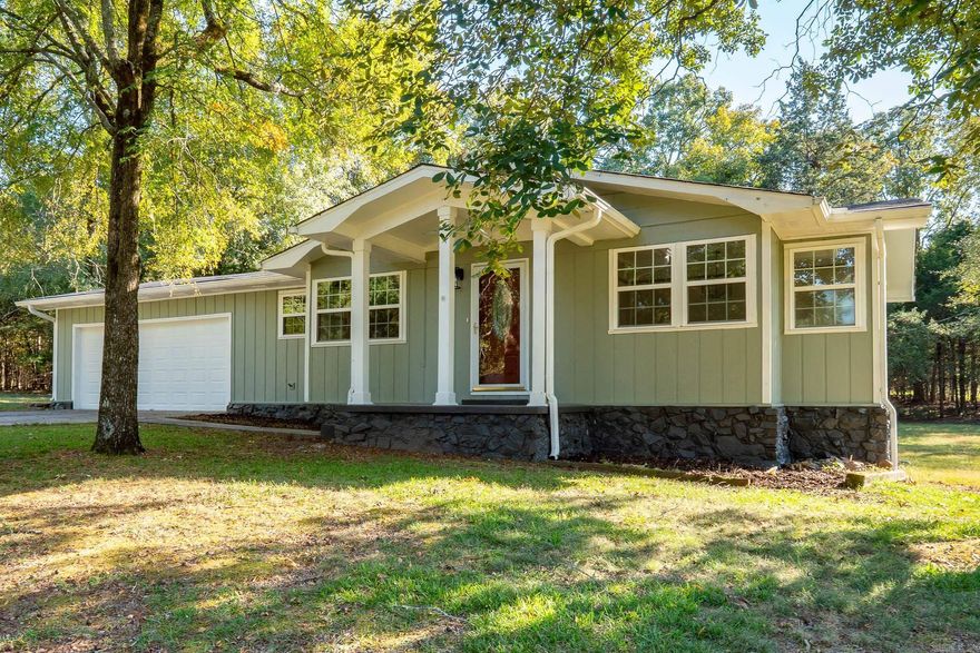 Completely remodeled in 2025, this 3-bedroom, 2.5-bath home with an additional office or dining room offers 1,768 sq ft of modern comfort in a peaceful, highly desirable area near the Peach Orchard/Cresthaven Subdivision. Enjoy quick access to I-40 and west Conway while surrounded by beautiful homes and a quiet rural setting. Updates include new shingles, fresh interior and exterior paint, new industrial-grade LVT flooring, new carpet, and tile throughout. The kitchen and baths feature elegant black pearl granite countertops, new vanities, fixtures, lighting, and fans—updated electrical and plumbing. The master suite includes a stunning walk-in tile shower and generous closet space. The large living room opens through French doors to a brand-new deck/bench seating, perfect for entertaining. The spacious kitchen offers an island and plenty of storage. Sitting on a 0.99 acre lot, this property could be purchased with adjoining tracts of land...totalling almost 4 acres for those seeking more space and privacy.
