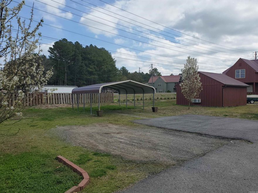 This vacant lot in Oxbow Landing Section 3 is currently being used for additional parking but could be used for a new residence. Two restaurants within walking distance and of course, the Little Red River! A must see!! The portable carport remains and conveys at no value to the new buyers!
