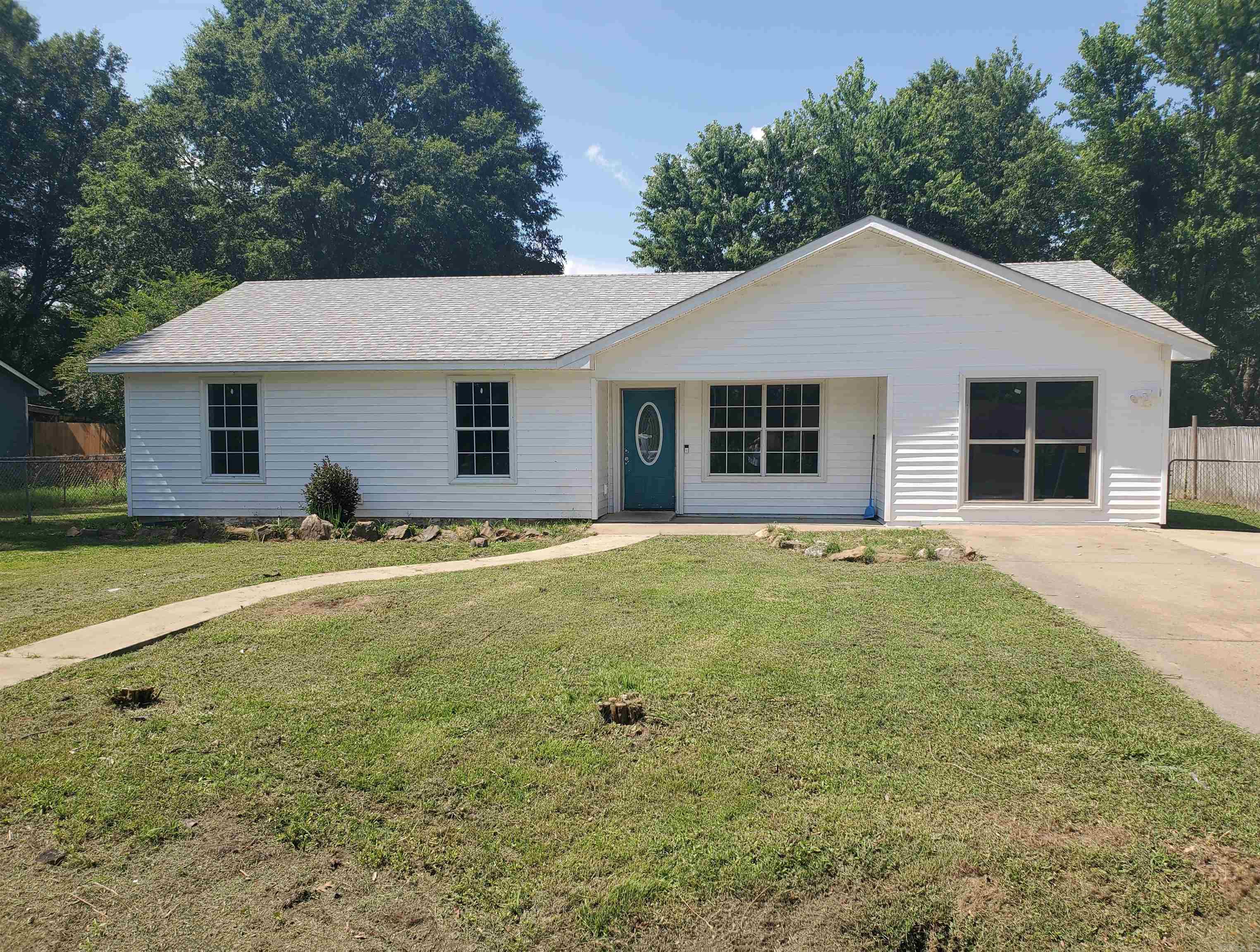 Great Bones! This ranch style home features a newer roof (4 yr), newer HVAC (6 yr), the garage was converted into two rooms of extra living space. It does need some TLC, but if you have the skills, this is a great property. AGENTS SEE REMARKS.