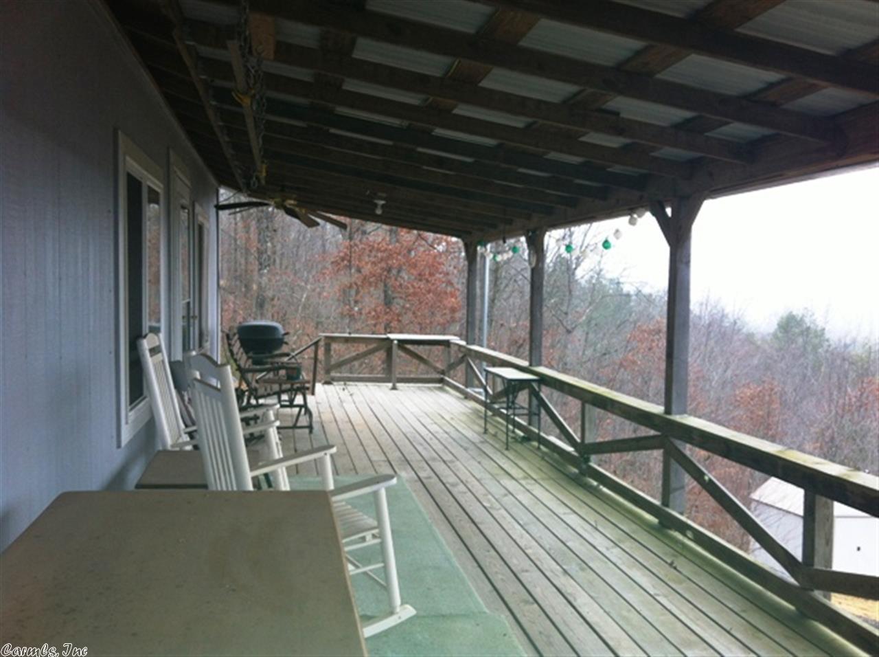 Newer Cabin with Amazing Mountain Views & National Forest Boundaries! Set your sights on the 7.54 acres with this 2-bedroom/1-bath home. Fully furnished! Only a short drive to Wolf Pen Gap Riding Trails. You'll enjoy a welcoming living room with wood floors, laundry with washer/dryer included, sunny kitchen with stainless appliances included. All with a large porch and nice storage building. $110,000.