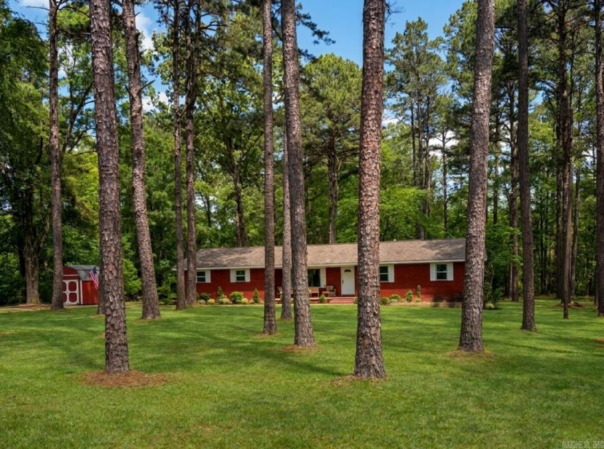 GREERS FERRY LAKE ACCESS less than 5 miles from Lacey’s Marina, this home offers the convenience of easy lake access, while also providing the privacy of 2.5 acres of flat, thoughtfully manicured trees that create a peaceful, park-like setting. Inside, you’ll find many updates, including beautifully done bathrooms & kitchen. The hall bath includes a soaking tub with subway tile surround. New windows, luxury vinyl wood plank flooring, new paint & added disc lighting are just some of the quality finishes you'll find. The primary bedroom has a cozy sitting area—your own personal retreat. Step outside to a spacious 13' × 15' covered back deck, perfect for entertaining or relaxing. Being completely closed makes it pet friendly and baby safe. There is also a path to a pergola, which is perfect for taking in the beauty this property has to offer.  All appliances convey, along with the storage building. As an added bonus, the seller is including a one-year home warranty. Discover the perfect blend of  comfort, convenience, privacy, and natural beauty on this stunning 2.5-acre updated property. 39 mi to Conway, 20 mi to Heber Springs & 20 mi to Clinton. SEE ALL FEATURES IN DOCS & PIC.