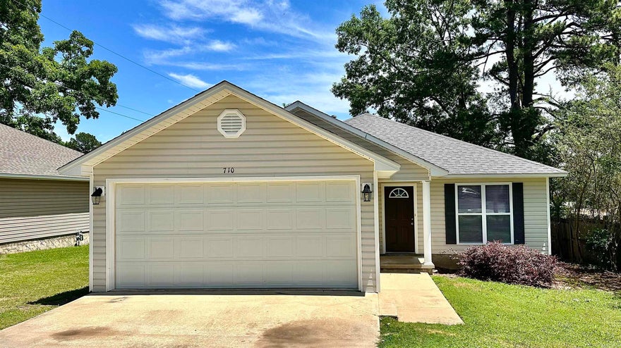 Charming 3-bedroom, 2-bath home featuring a split floor plan and a spacious layout perfect for everyday living. This move-in ready home offers fresh paint and new flooring throughout, giving it a clean, updated feel. The great floor plan provides comfortable living spaces with plenty of natural light, while the large back deck is ideal for entertaining, relaxing, or enjoying the outdoors. Whether you’re a first-time buyer or looking to downsize, this property makes a fantastic starter home with both comfort and functionality!