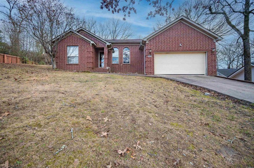 Charming one-story brick home located in the Park Hill subdivision of North Little Rock. This 3-bedroom, 2-bath residence offers approximately 1,375 square feet with all bedrooms on the same level. Features include an eat-in kitchen with kitchen/dining combo, electric range, dishwasher, refrigerator to convey, gas-starter fireplace, central heat and air, and a mix of carpet, tile, and laminate flooring. Exterior amenities include a deck, paved street access, and a two-car garage. Showings begin Monday Jan. 12th | 10:00 AM – 4:00 PM