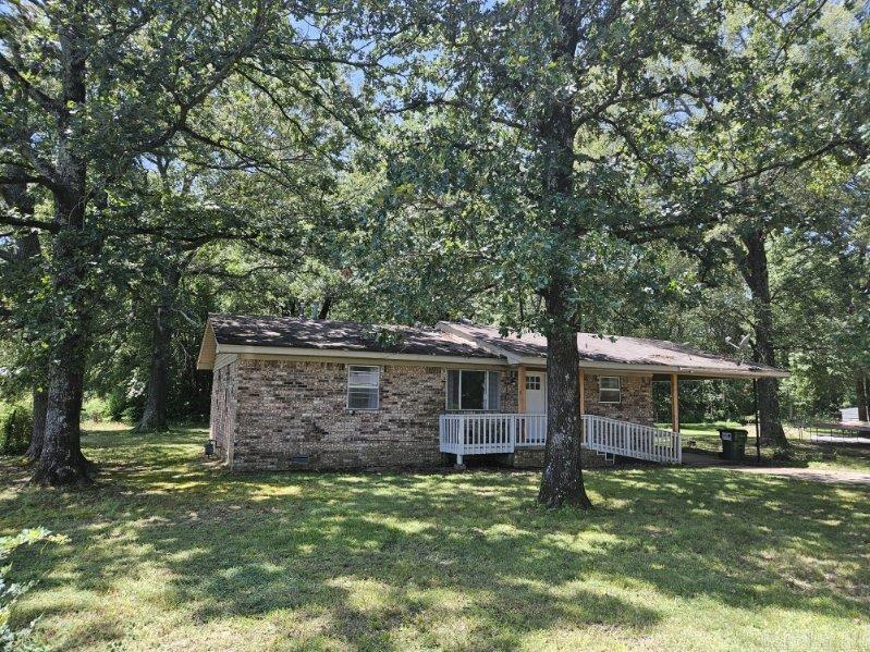 Charming home with pasture view to the side & woods to the back! Minutes to Petit Jean Mountain, 30 min. to Conway & an hour to Little Rock. Crisp, clean interior, open kitchen/living/dining room, large master suite. No worries about the price of eggs with the BIG chicken coop plus room for a garden! Also, nice storage building & shed. Many recent updates from the floors to the quartz countertops!! .