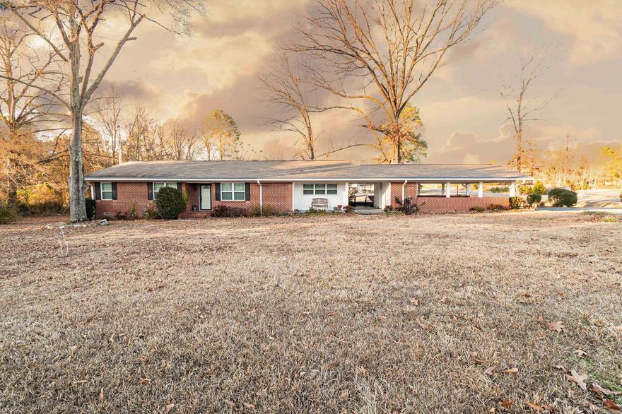 Beautiful 3-bedroom, 2-bath home situated on 2.71 acres with plenty of room to spread out. This property features fresh paint and new flooring, lovely hardwood floors, and an updated master bathroom. The kitchen is equipped with stainless steel appliances and offers great functionality for everyday living. Multiple storage buildings provide ample space for tools, equipment, or hobbies. Enjoy peaceful country living with modern updates and room to grow.