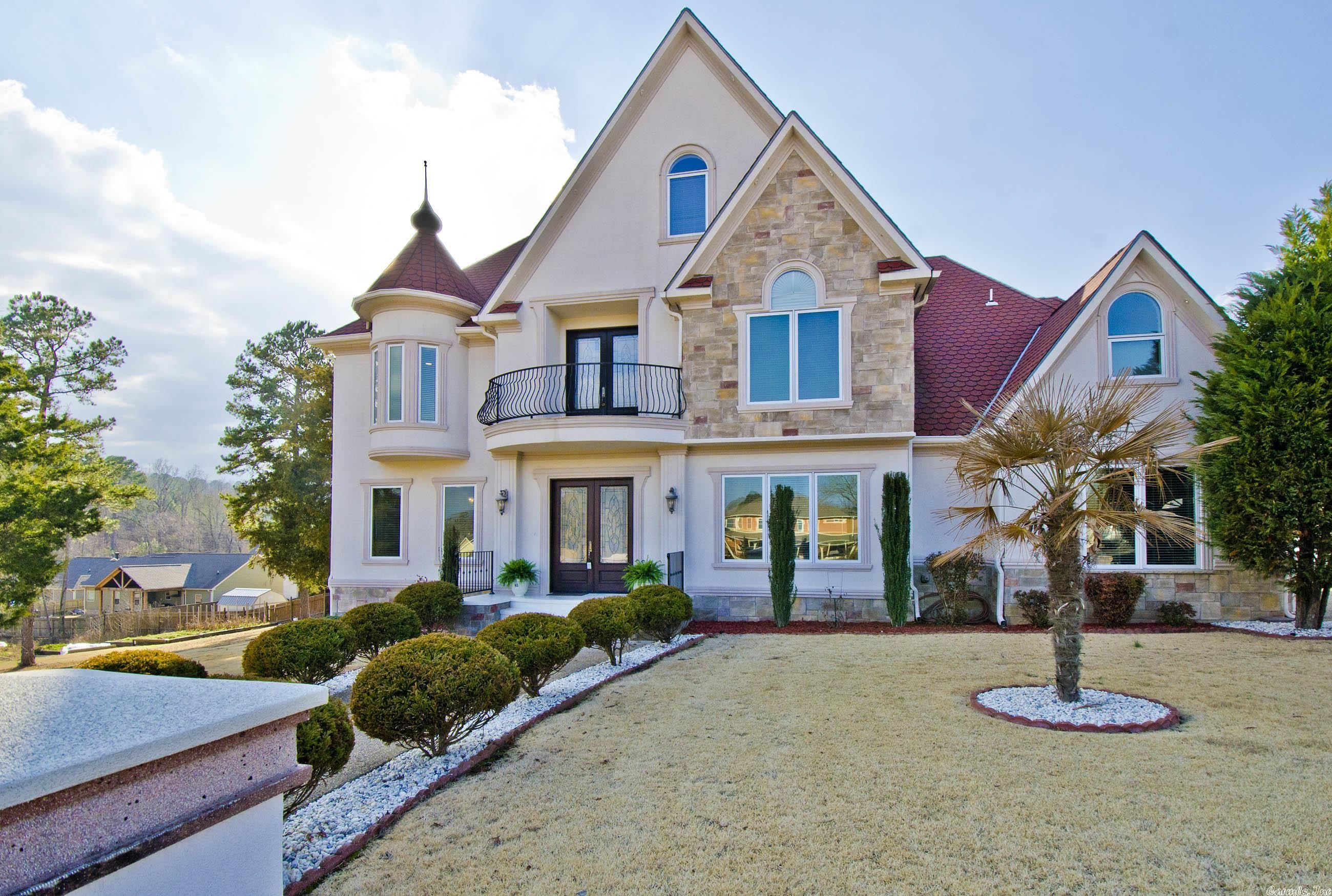 This custom built home features the finest quality materials in highly desirable gate-guarded Ironwood Estates. Built with a distinctive architectural style to stand the test of time, this home includes a balcony, turret, and a 700+ SF outdoor fully enclosed kitchen w/ fam room/fireplace & heated floors added in 2019. Smart floor plan with downstairs devoted to entertaining while all bedrooms occupy second level to ensure family space remain private! Sep office, formal living/dining, storage room, and 3-car garage. 3rd floor theater room w wet bar. Single owner has maintained the home above most others including kitchen/bath renovations.