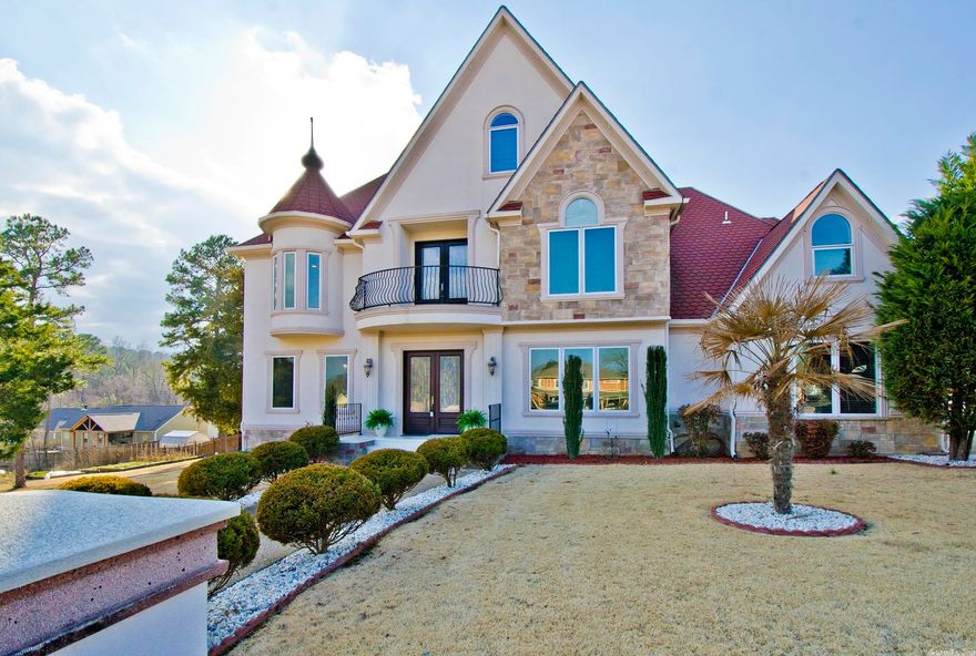 This custom built home features the finest quality materials in highly desirable gate-guarded Ironwood Estates. Built with a distinctive architectural style to stand the test of time, this home includes a balcony, turret, and a 700+ SF outdoor fully enclosed kitchen w/ fam room/fireplace & heated floors added in 2019. Smart floor plan with downstairs devoted to entertaining while all bedrooms occupy second level to ensure family space remain private! Sep office, formal living/dining, storage room, and 3-car garage. 3rd floor theater room w wet bar.  Single owner has maintained the home above most others including kitchen/bath renovations.