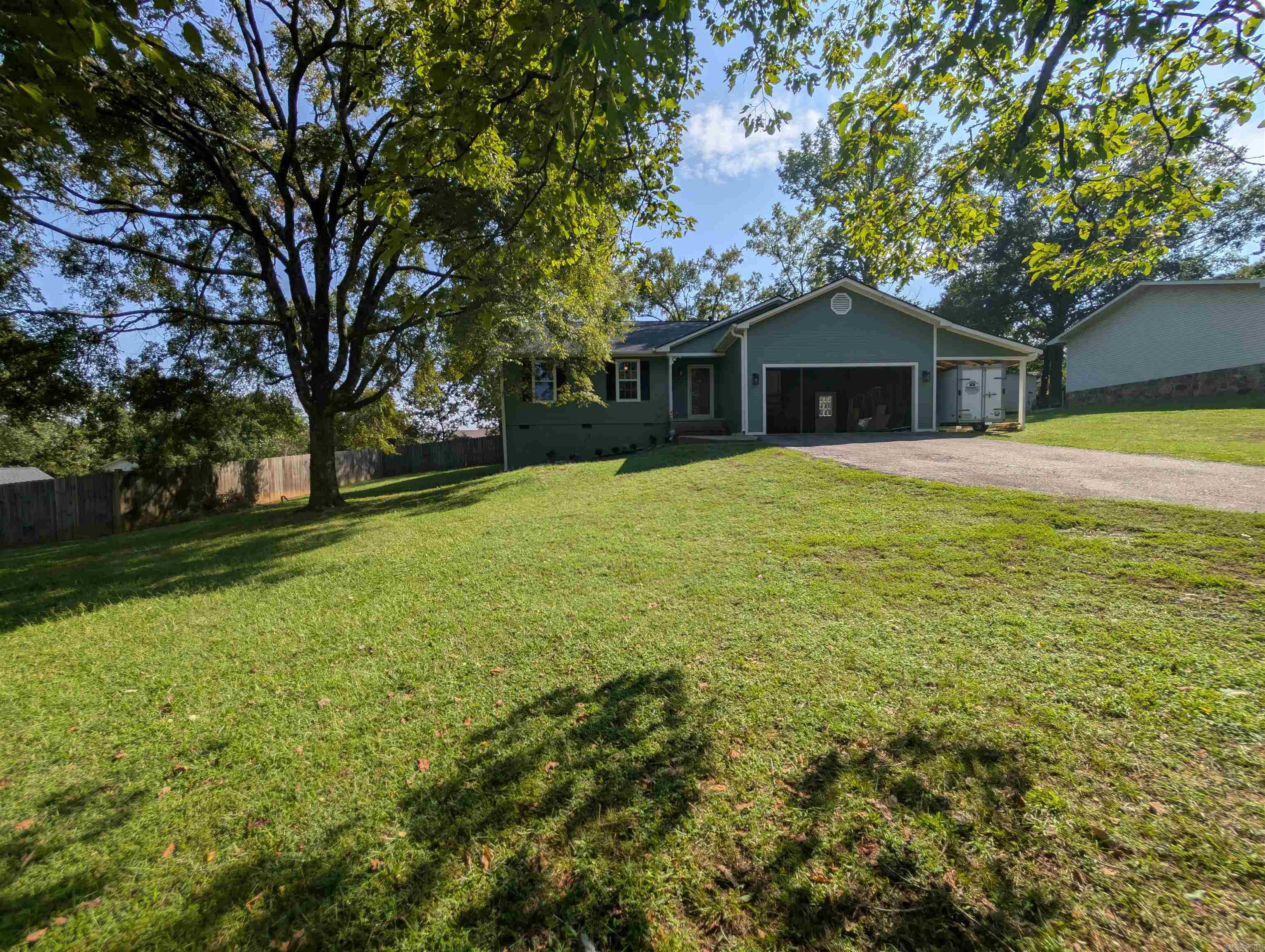Jodi Davis ***479.567.6670 ***$$ Seller Contribution to Buyer's closing costs up to $5000.00 $$ *** Entire Home & Roof Renovation ***Stainless Steel Kitchen *** Open Space Plan Layout with Vaulted ceilings and Fireplace *** Master Suite, Walk-in Closet with a Master Bath ***New Contemporary Vinyl Waterproof Flooring Throughout ***New Contemporary LED Lighting Package and Fans ***Large Manicured Landscaping with Mature Trees*** Large Rear yard Entertainment Deck and protective privacy fence *** Detached Private Shop *** Near Shopping and Entertainment Venues *** Family Friendly Community