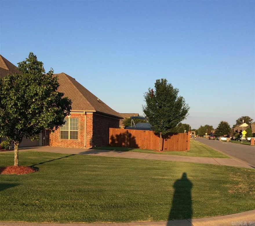 Beautiful  home, Well maintained, 4 bedrooms, one upstairs which could be used as a bonus room or office, greatroom, hearthroom that opens to kitchen, with extra bar area, large pantry,  separate laundry room, separate utilitiy closet, garage has built in cabinets with plenty of storage, wonderfully landscaped yard with lighting, fully fence back yard, sprinkler system. This home is located on a nice corner lot, with lots of curve appeal. A Must See home!!!!