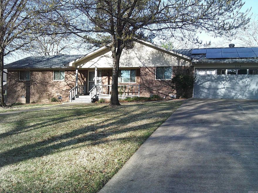 All brick home in established Lake Hamilton subd. This 3/2  home has been WELL maintained and seller has updated top to bottom! The garage is heated and cooled as well as the "man cave" below the home. HVAC, mini split, and new windows in 2025. Updates since 2020 include appliances, fixtures, water heater, garage door opener, paint, LVP flooring. 2023 new ROOF, new gutters w Leaf Filter , and solar panels for great savings on utilities! Concrete pad/plumbing ready for whole house generator. RING alarm/cameras convey (monitored for only $100/yr) Dryer & range can be gas or electric. When weather permits, open the windows and enjoy the attic fan. CUL DE SAC LOCATION NEAR WATERS EDGE WITHOUT THE LAKEFRONT PRICE!!! WATER VIEWS.  Private boat ramp for residents use. Deck and firepit in the well maintained back yard to enjoy outdoors and lake life. Lawn sprinkler waters from lake. Entire subd is well maintained...you will love calling it "HOME"...  AND it's SO CLOSE to shopping, restaurants, hospital, and OAKLAWN CASINO RESORT too! Basement area not included in sq footage.   AGENTS SEE REMARKS.