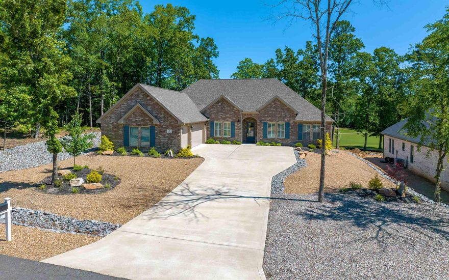 Beautiful Carriage built home under 3 years old with a beautiful view of Isabella golf course. Large covered patio faces north for cool, enjoyable times outside. Open concept with divided bedrooms. Primary suite with large bath, spa type shower, large walk in closet connecting to utility room Hardwood floors in most of the house, granite counter tops. Stainless appliances. Plantation shutters where needed. Three car garage with walk up to attic storage, low maintenance landscaping - better than new on a great lot!  SEE AGENT REMARKS