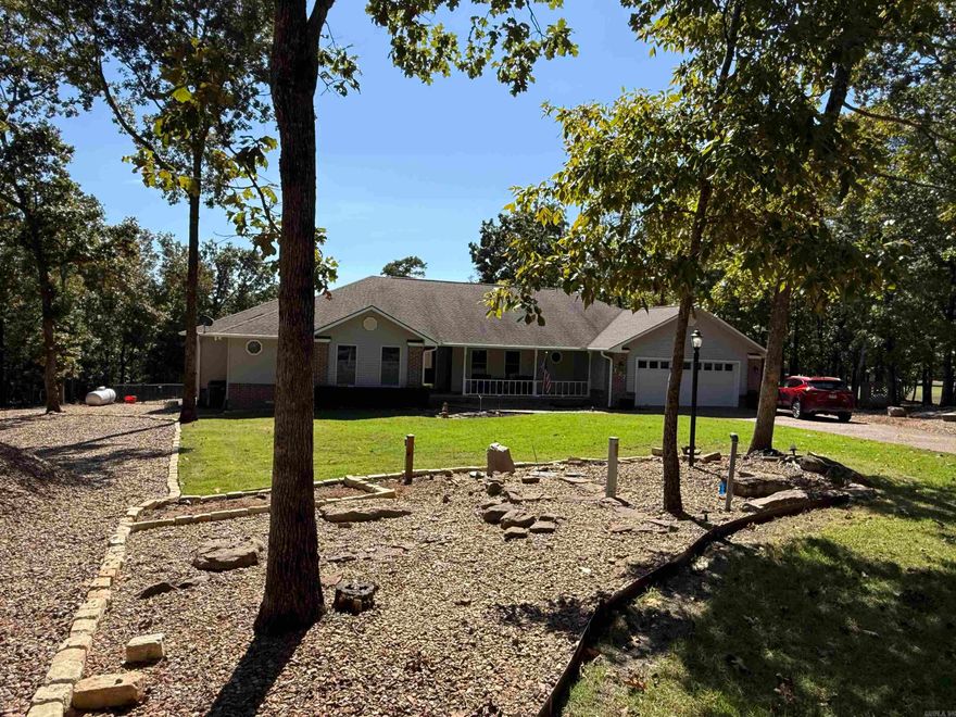 DREAMS DO COME TRUE!!!  You won't find a better built or maintained home.  "Move-in ready" is an understatement.  Plus the location on the golf course is premier, with a spectacular view.  The 3BR, 2.5Ba home sits on a double lot, plus an adjoining lot is included, giving you plenty of space.  Everything is on one level-- living room with gas fireplace & nice bookcases, formal dining to accommodate a large suite of furniture, spacious kitchen has breakfast nook with a view, pantry, desk, & adjoining laundry room/half bath.  The bedrooms have walk-in closets & room for large furniture.  The primary bath has garden tub, 2 vanities, shower.  LVP flooring throughout.  From the living room, step out to a screen porch overlooking a fenced backyard & the golf course.  There's also an open deck to enjoy.  Don't miss the oversized garage that has storage galore & a shop. The landscaping is very managable with sprinkler system for zoysia, & gravel spaces.  There is plenty of parking, including adjacent drive for extra vehicles, RV, or even space to build a detached garage or covered parking!  EXTRAS:  Roof in '17; 2 new water heaters; generator; updated decks '21. Much more!