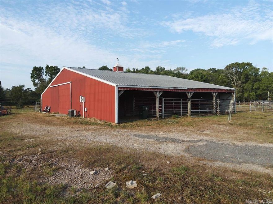 The RED Barn with 10+ Acres! What a rare find! The majority of the acreage is fenced. Water and electricity on property. Concrete floor in barn. This unique property offers so many possibilities. Convert the barn into your personal Barndominium. Build your dream home and be close to your horses. Small creek on the back side of the property. The slab area of the barn is 36' X 48'. The shed area with covered stalls is15' X 48' on each side. Barn built in 1997.
