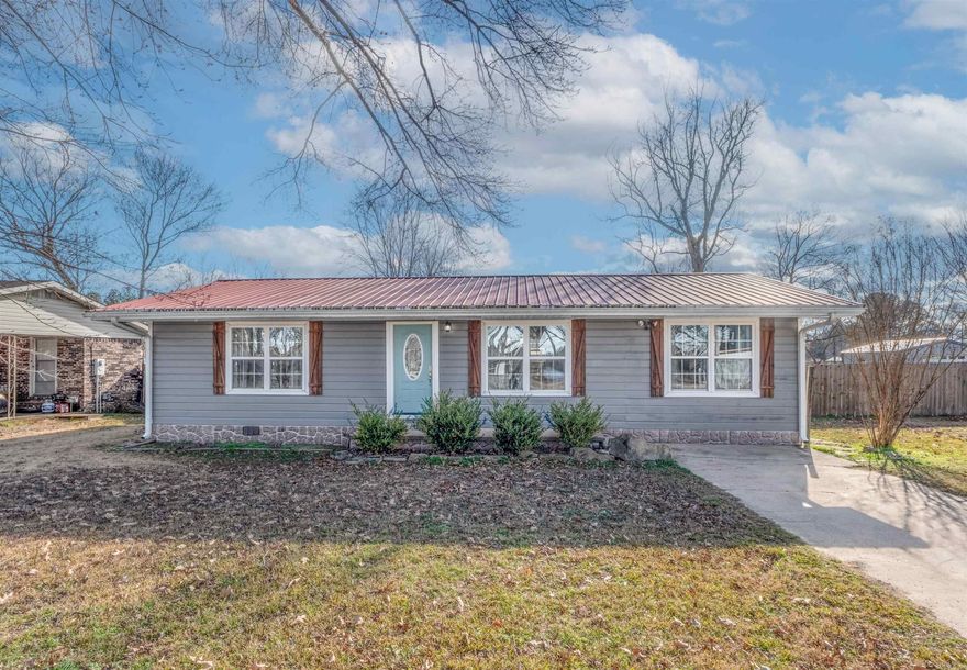 Spring and summer are right around the corner. Nows your chance to own a fully furnished 3 bedroom 2 bath home offering 1,152 sq. ft. on two lots totaling .52 acres, this property sits directly across from lake front homes and just down the road from a marina with easy access to boating and fishing.   Inside features hardwood flooring and a functional layout, plus a rear deck perfect for relaxing after a day on the water. An insulated storage/shop building and RV hookup with carport add extra flexibility for guest or gear.   Move in ready and perfectly positioned to enjoy lake season from day one.