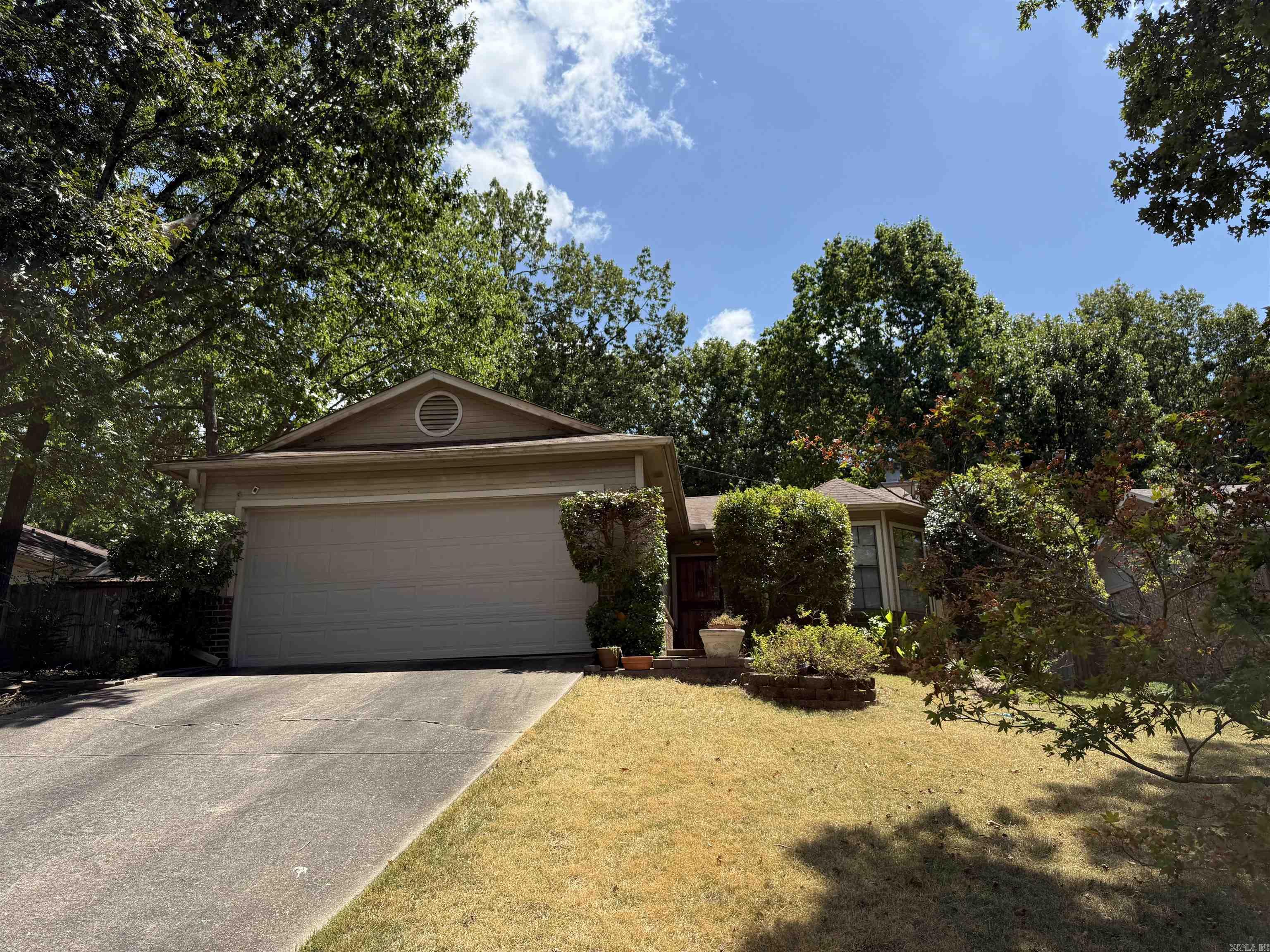 Charming Opportunity in Point West! This 3-bedroom, 2-bath home is a hidden gem bursting with potential. With a little TLC, it can truly shine! Inside, you’ll find arched ceilings, a spacious layout, and plenty of character throughout. Recent upgrades include a new water heater and HVAC system installed in 2022—giving you a head start on improvements. Whether you're looking for your next investment or dreaming of customizing your perfect home, this property offers the ideal canvas. Don’t miss out on this fantastic opportunity in a desirable WLR neighborhood! Agents please read remarks