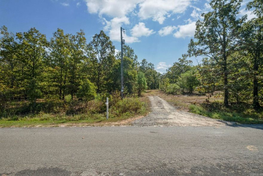 Beautiful lot for your next home! Private area with great views and NO RESTRICTIONS! Close to Cabot but outside of city limits. Electricity on the property and water at the road.