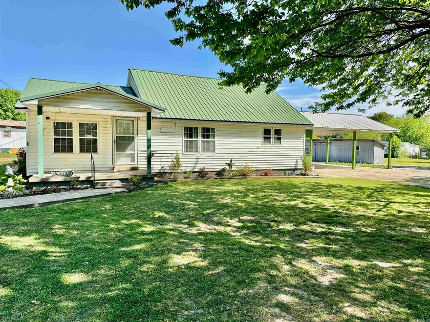 Situated just outside of Paragould city limits on 1 acre +/-, this quaint country cottage is ready for its new owner's touch. This property is clean on the inside and out. Beautifully landscaped flowerbeds and the flagpole in the front yard really adds to the curb appeal of this home. Inside you will find a newly painted, crisp white kitchen with electric range and plenty of cabinetry. Two large open areas give plenty of space for dining and/or family rooms. There are two good sized bedrooms each with closet space. A newly renovated bathroom features a walk-in shower, new toilet, and new vanity. Also, you will find a laundry/utility room ready for electric dryer and washing machine. Walking outside you will find a huge shop on the south side of the property complete with electricity, large sliding doors, and concrete floors. This would make a perfect workshop, garage, etc. Must see to appreciate the potential with this one!