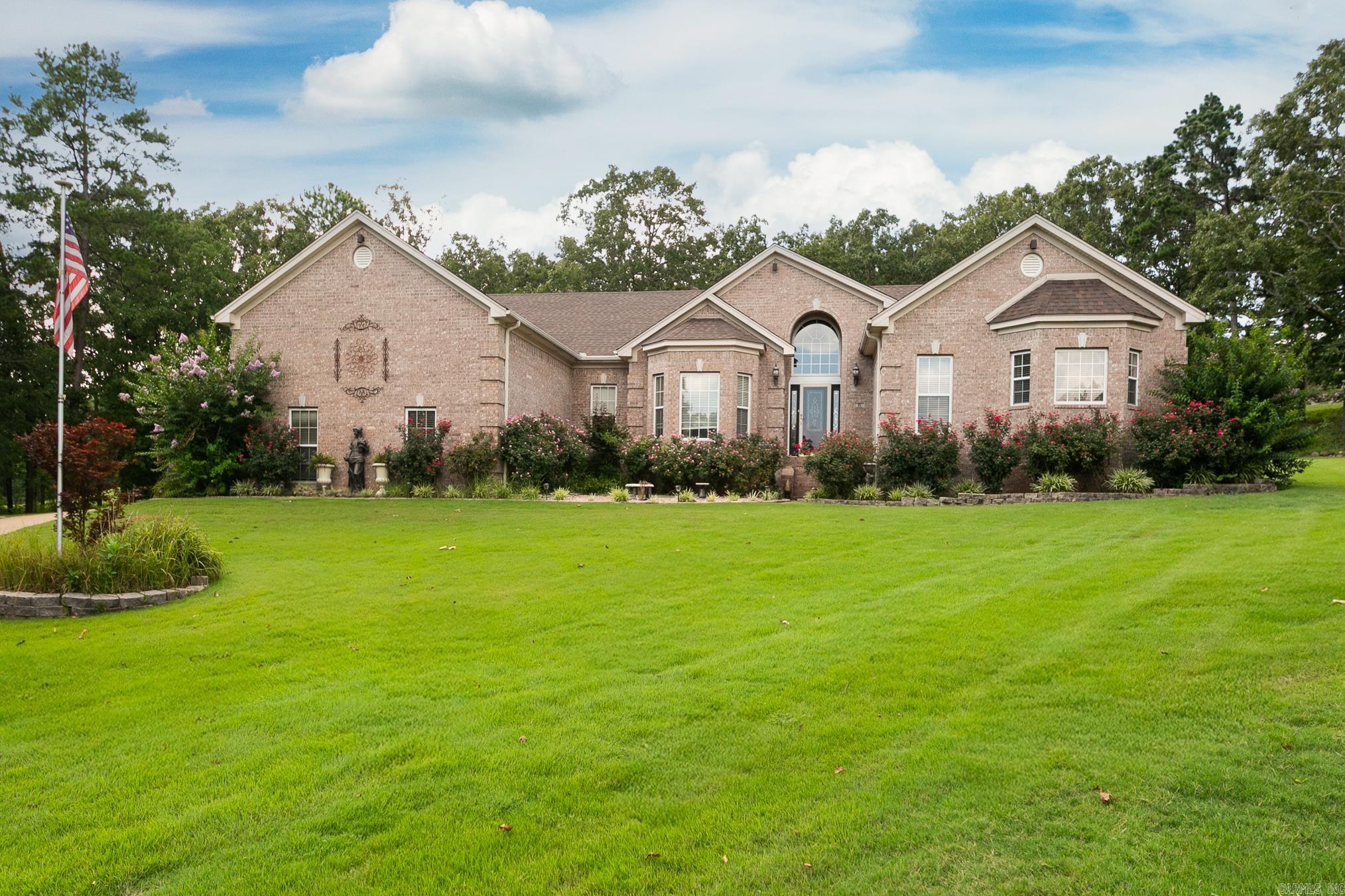Nestled in the charming community of Cabot, Arkansas, 16 Gleneagle Cove is a picturesque property that perfectly combines comfort, convenience, and contemporary living. This delightful home boasts an open floor plan that seamlessly connects the living, dining, and kitchen areas, making it ideal for both entertaining guests and enjoying quiet family time. The kitchen is a culinary enthusiast's dream, featuring top-of-the-line stainless steel appliances, elegant granite countertops, and ample cabinetry for all your storage needs. The master suite is a true retreat, offering a spacious bedroom, a luxurious en-suite bathroom with a soaking tub, and a walk-in closet. Additional bedrooms provide flexibility for a growing family, a home office, or guest accommodations. Step outside to a beautifully landscaped backyard, perfect for summer barbecues or relaxing under the stars. This home also includes a two-car garage, providing convenience and additional storage space. Located in a friendly neighborhood with easy access to local amenities, schools, and parks, 16 Gleneagle Cove is more than just a houseāit's the perfect place to call home.