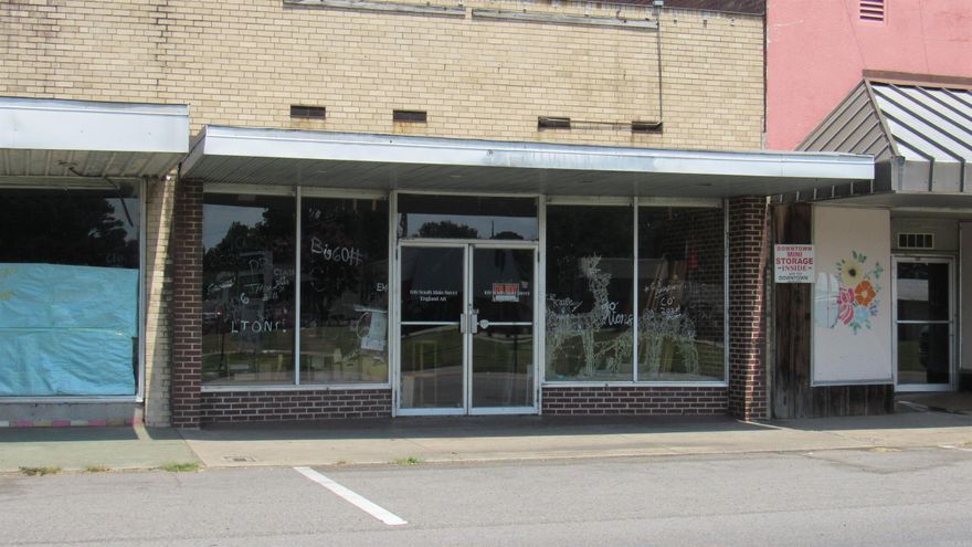 Very good store front location in Downtown England, Arkansas. With just over 3200 square feet of open floor space there in ample room for many uses. Currently it is used as storage but has been rewired for commercial use. Call listing agent or your Agent for showing information. Note: the Age of building field is not accurate and is unknown. The number placed there only to fill a required field. Square footage and Lot dimensions are approximate. Measuring Encouraged.