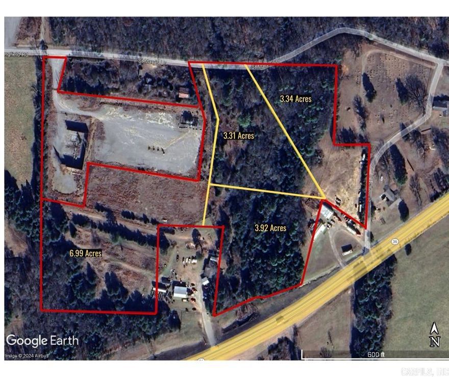 Unrestricted, Beautiful wooded and open area with a rock bottom creek that makes a fork on the property. The property has access from hyw 36 and multiple locations on St Marys lane. This is 3 acres but has up to 18 acres for addtional money  with city water can be split up. See attached survey.
