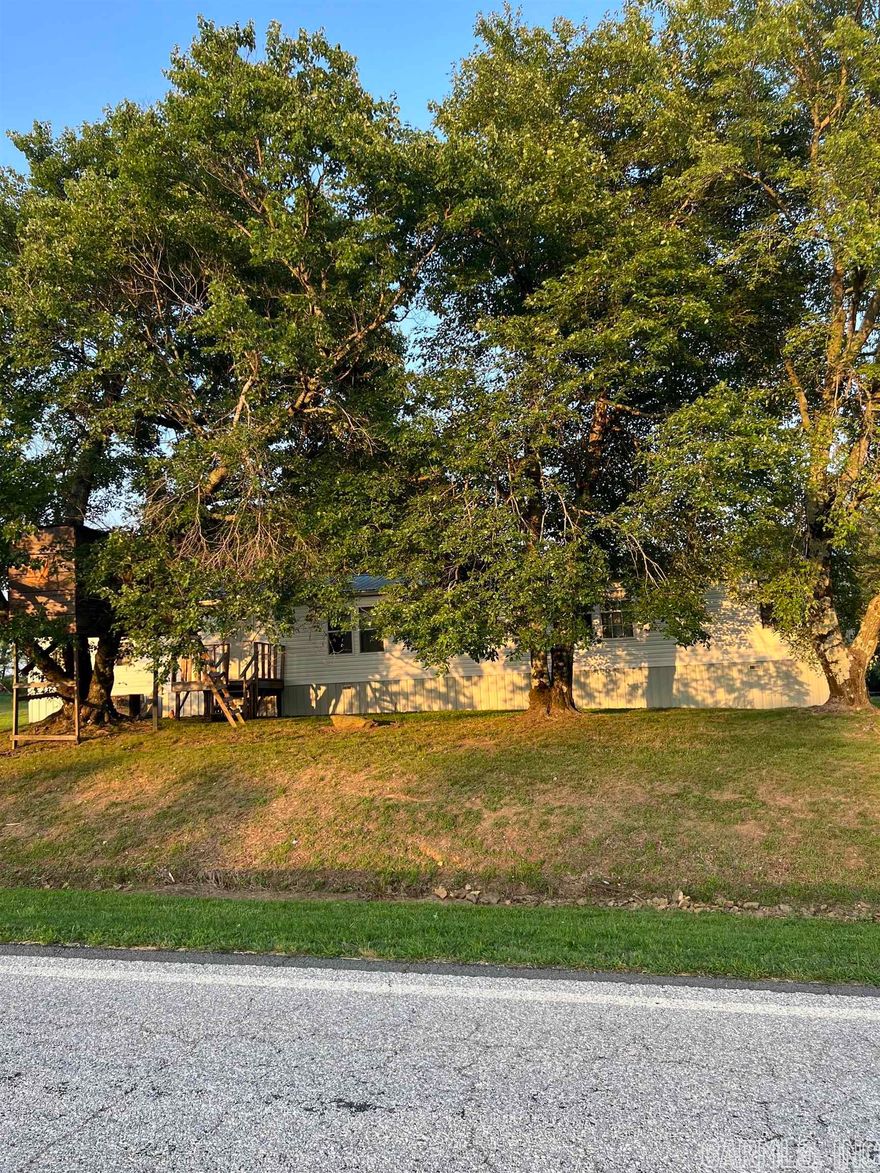 What a great home in the country with plenty of room for a big family.  This 4 bedroom 2 bath home has bonus room, laundry room, nice screened in new porch/room , new roof, new underpinning, large back yard, big shade trees, spring fed well, wet weather creek, tire swing, apple tree, mulberry trees, blackberry bushes, and so much more.  Don't let this home in the country slip away.