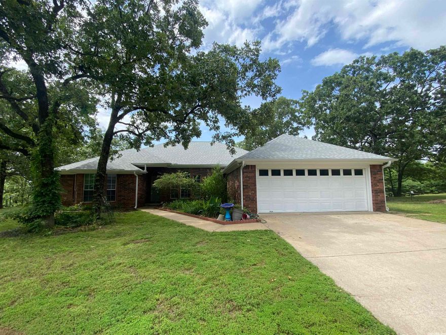 Sit on the back deck and enjoy the breathtaking view. The home sits on 8 acres and includes a 30x40 shop with electricity, plus a 3 stall barn. This split floor plan home features 2,187 sqft of living space and high ceilings on a large wooded lot.  Call today for your personal tour! Professional pictures coming soon!