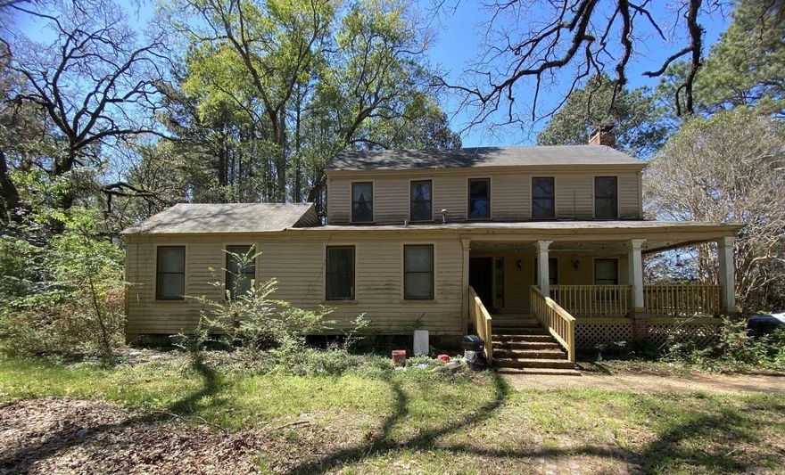 The Joel Smith House is a historic house at the County Route 5 in rural Union County, Arkansas. Built c.?1840, this two-story vernacular I-house was the home of Joel Smith, one of the first white settlers of Union County. The house is a rare surviving early example of a typical colonial-style house with matching shed-roof side porches. The property is also thought likely to yield archaeological finds useful in assessing and understanding frontier life in the area.  The house was listed on the National Register of Historic Places in 1990.