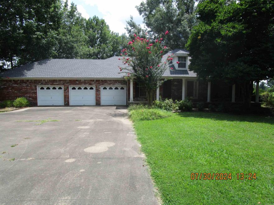Country living at its best! Beautiful custom built home with extra storage throughout and a large laundry room. Pella windows and doors, upgraded carpet, Decor oven and upgraded appliances, new granite countertops and backsplash. Extremely well maintained home with a new roof and fresh paint.  The third bay of the three car garage has front and rear roll up doors, with extra space for a small workshop or additional storage.  There is a storage room off of the garage that also opens up to the half bath and laundry room.  Wood burning fireplace in the living room with an insert.  To many features to list. House sits on five level acres, with an additional 35 acres available.