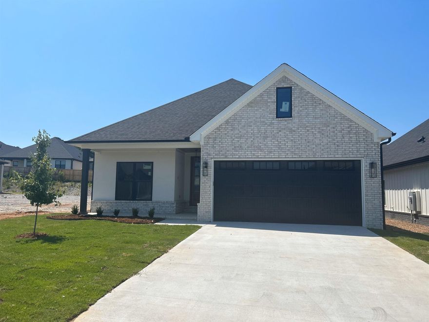 Beautifully built home as if is was a custom. 3 Bedroom and 2.5 bathrooms. Lots of detail from this experienced builder.  Big open kitchen and living. Large master closet connected to the laundry room. Tankless hot water.