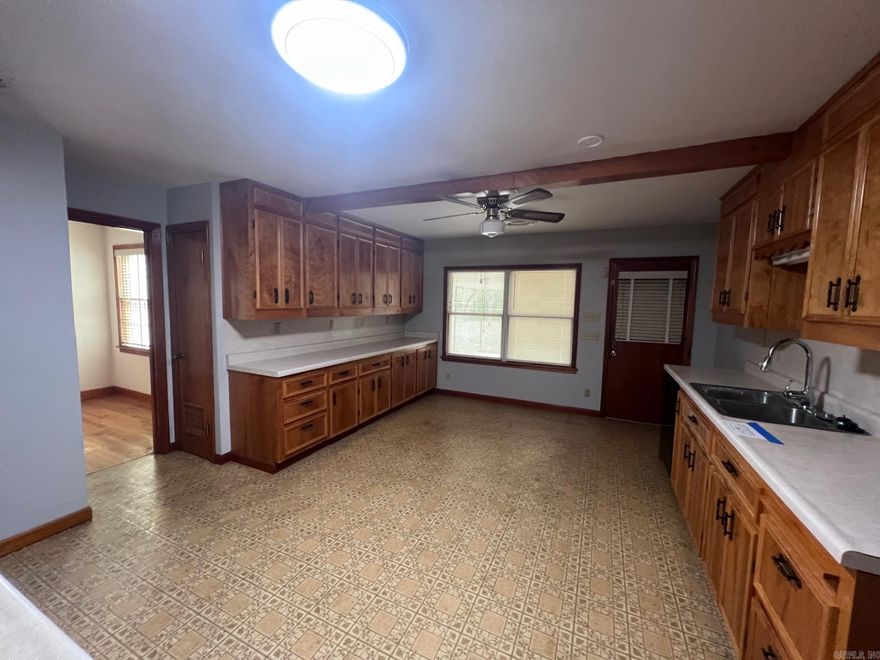 Super clean and move in ready! Lots of beautiful wood cabinets and wood flooring. Newer AC unit. Spacious fully fenced backyard nice patio for entertaining outback. Large storage building in the backyard. One car garage. Perfect for first time homebuyer or Invester!