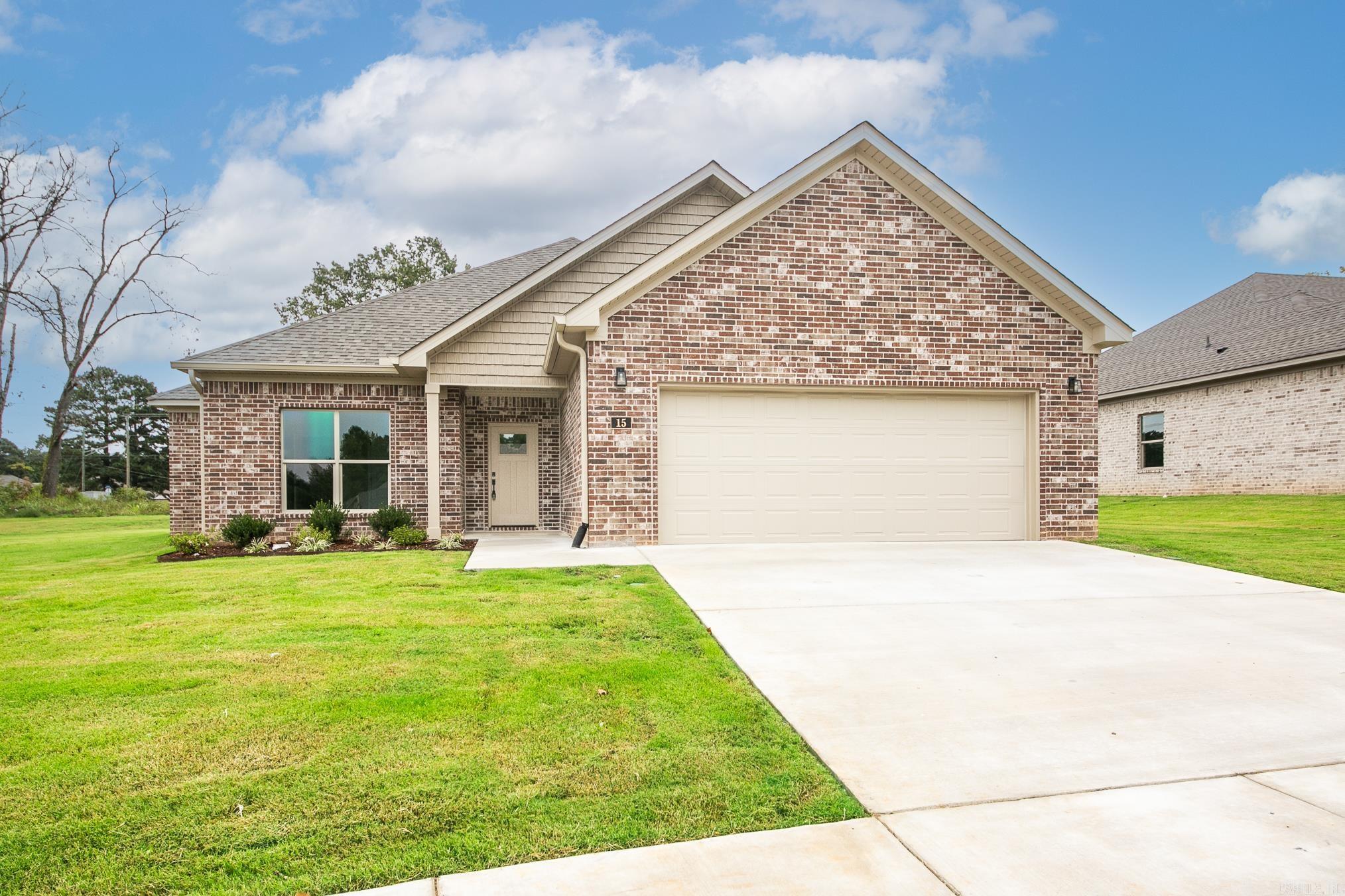 Welcome to Carmel Oaks, one of Cabot's newest communities, only 12 miles from the Little Rock Air Force Base. This NEW construction floor plan offers 3-bedrooms and 2-bathrooms. As you enter, youāre greeted by tall ceilings, a cozy fireplace, crown molding, and an open floor plan that seamlessly connects the living, dining, and kitchen areas, creating a perfect space for entertaining family and friends. The MASSIVE living area features natural light and a seamless flow into the designated dining area with a great view of the covered back patio! This home utilizes SOLAR board roof decking for energy efficiency. Other features include: floored attic space for ample storage, 42" custom kitchen cabinet upgrades, granite countertops, custom kitchen pantry with a receptacle for your coffee station, LVP flooring, tiled shower in the master bathroom, comfort height toilets, large custom walk-in master closet, 50 gallon water heater, recessed lighting AND ceiling fans, elegant finishes and neutral tones to enhance versatility. This property is also equipped with an irrigation system. Located in highly sought after Cabot School District. Several new-homes and floor plans to choose from!