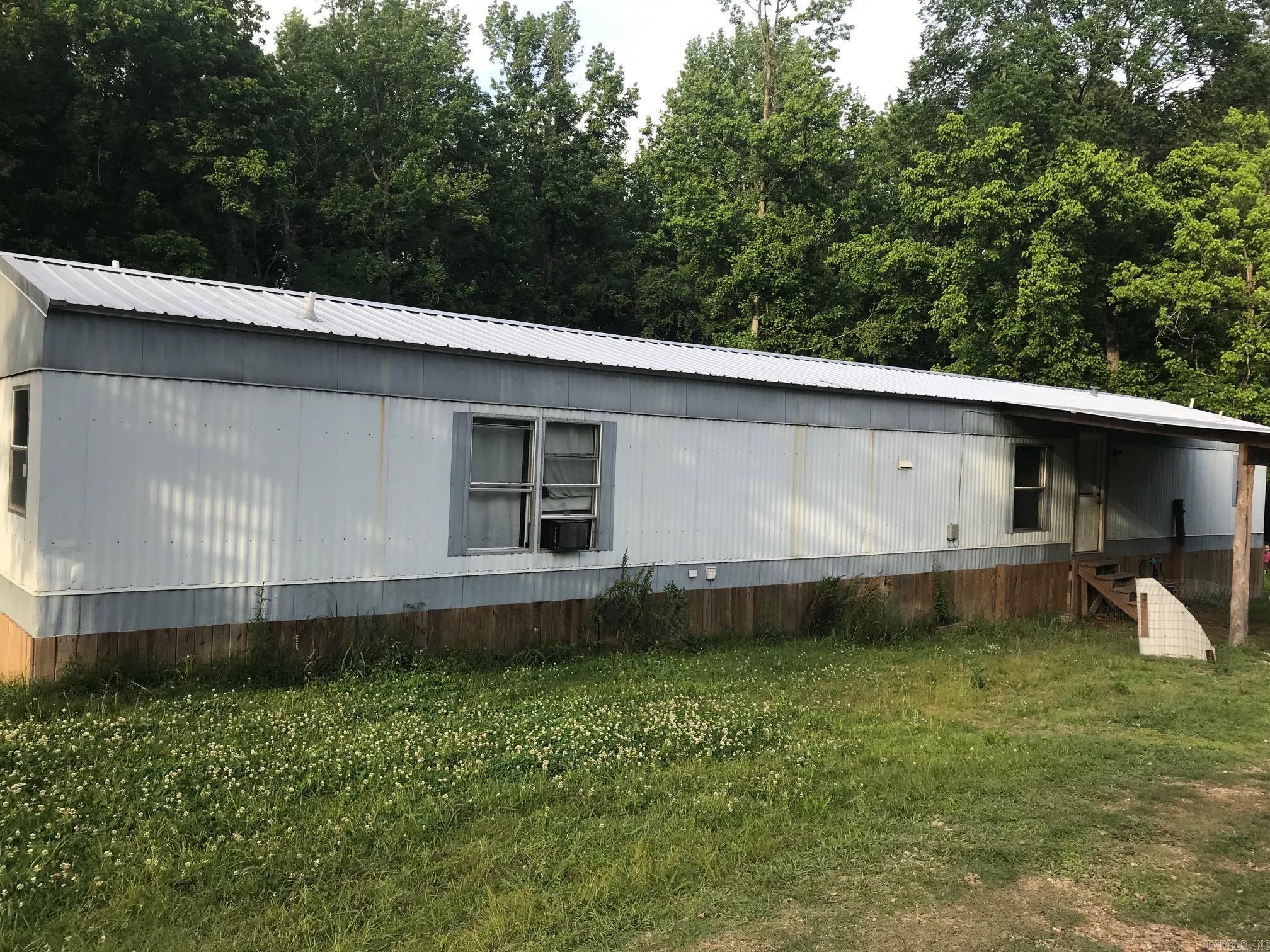 1996 Mobile home, 3 Bedroom, 2 Bath for sale in the city limits of Lockesburg, AR. New metal roof and underpinned. Central heat and window air conditioners. Would make a great starter home or investment property located on 2.5 acres m/l.
