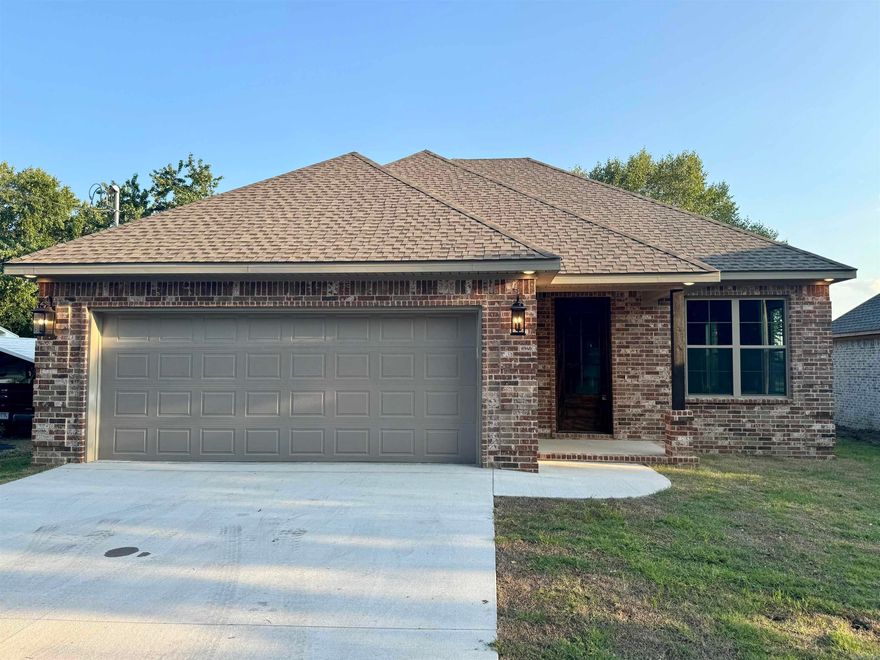 Discover this beautifully crafted 3 bedroom, 2 bathroom home featuring elegant design and thoughtful details throughout. The open floor plan is enhanced by high ceilings and abundant natural light, creating a spacious feel that's perfect for both relaxation and entertaining. The gourmet kitchen, complete with granite countertops, modern fixtures, and an island, is ready for your culinary creations. The master suite offers a private retreat with a luxurious bath, including a freestanding tub, a custom-tiled shower, and a dual-sink vanity. Each additional bedroom is generously sized, ideal for guests or a home office. This home combines stylish design with everyday comfort, ready for you to move in and enjoy. Schedule a private showing today to see all this home brings firsthand!